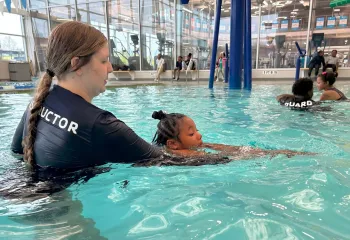 Safety Around Water instructor and child