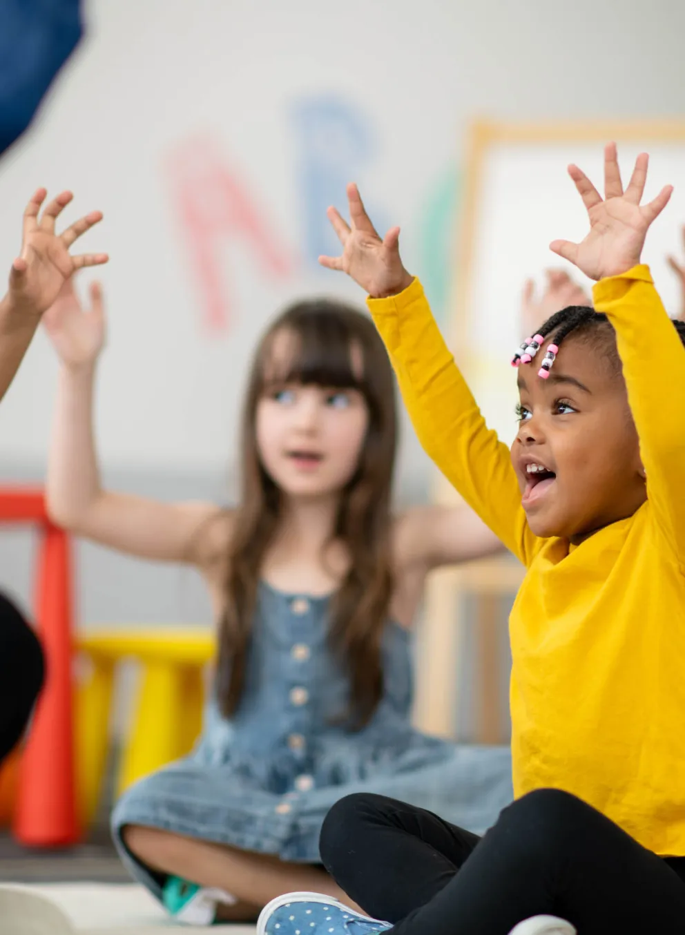 Children shouting in joy at YMCA child development center